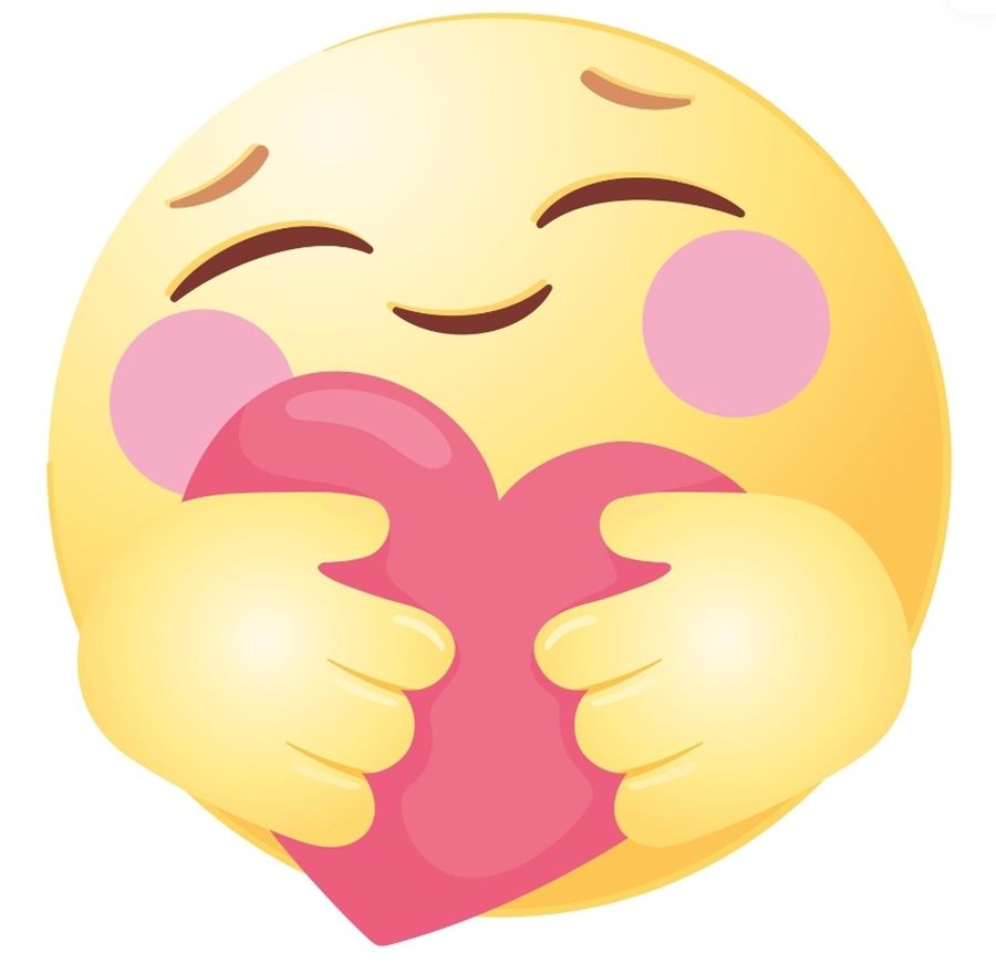 Carita abrazando un corazón